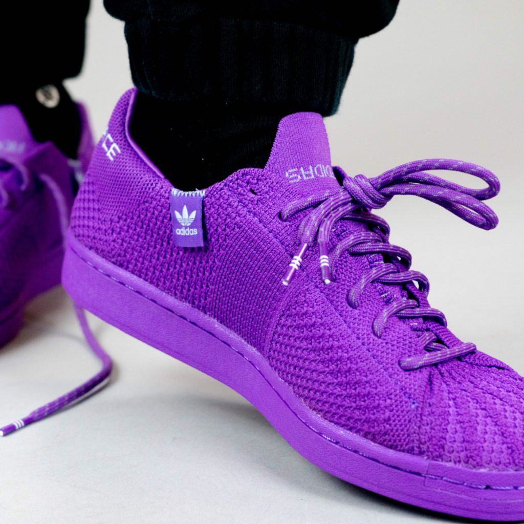 purple human race shoes