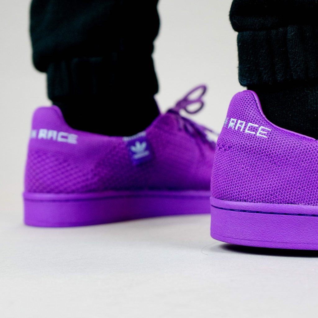 purple human race shoes